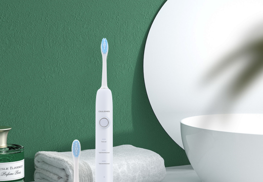 Электрическая зубная щетка